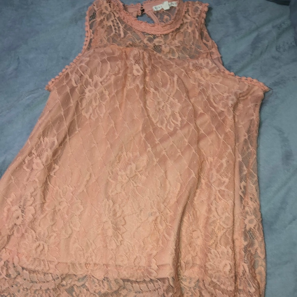 A light pink small dressy tank top